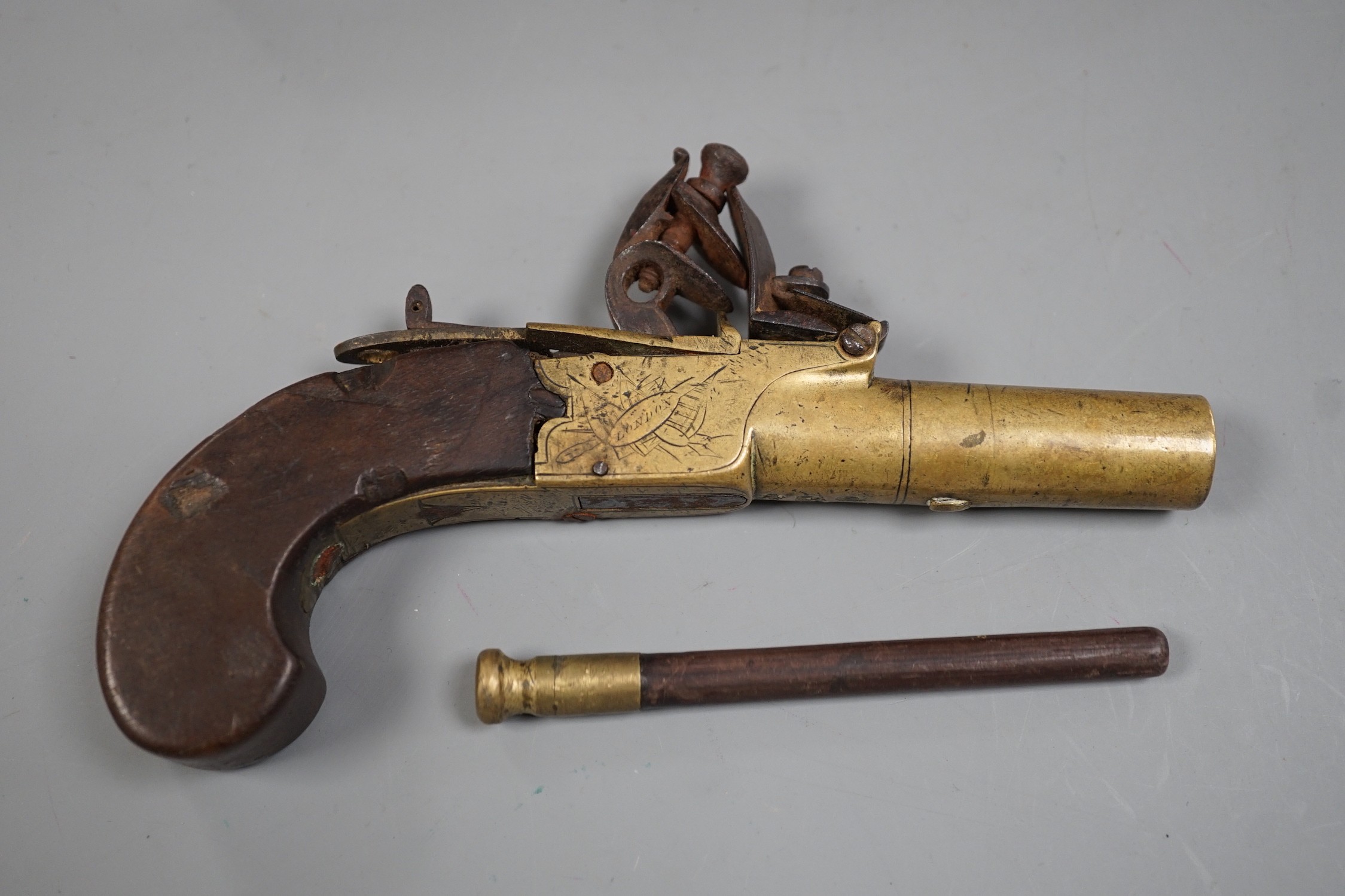 A George III flintlock pocket pistol by Sharpe, London, in a later fitted rosewood case